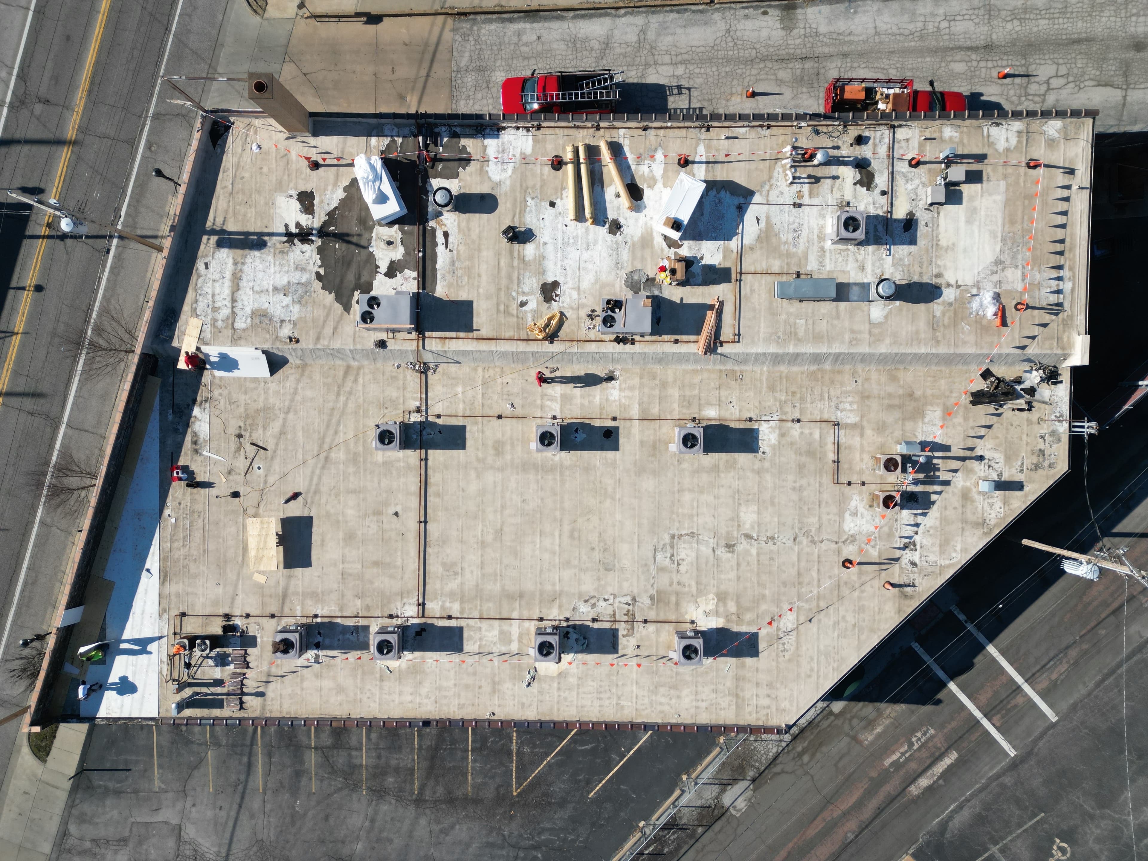 Before — Large-Scale Commercial EPDM Flat Roof Replacement — Retail Strip Building