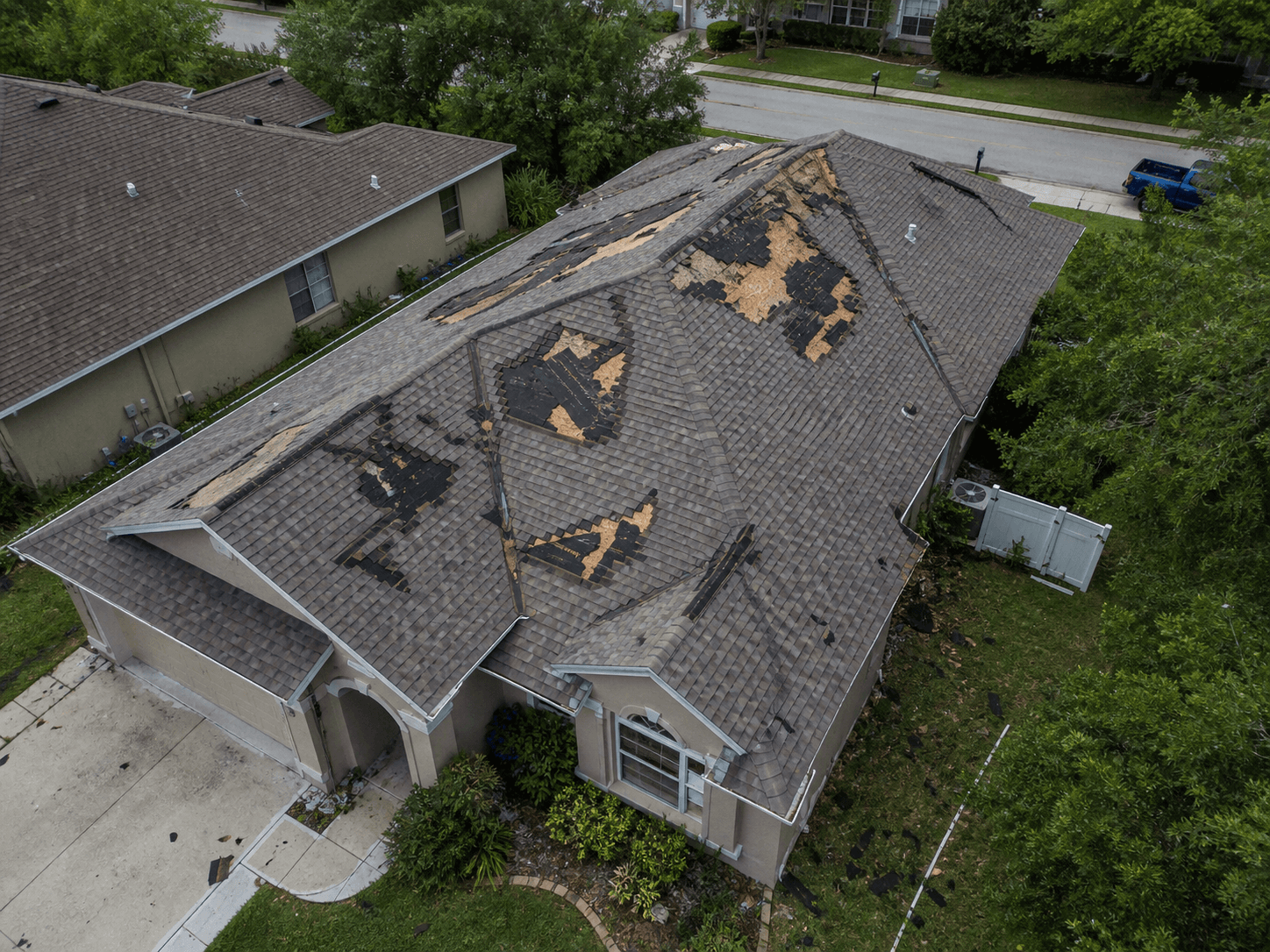 Before — Storm Damage Roof Replacement — Green Valley Ranch